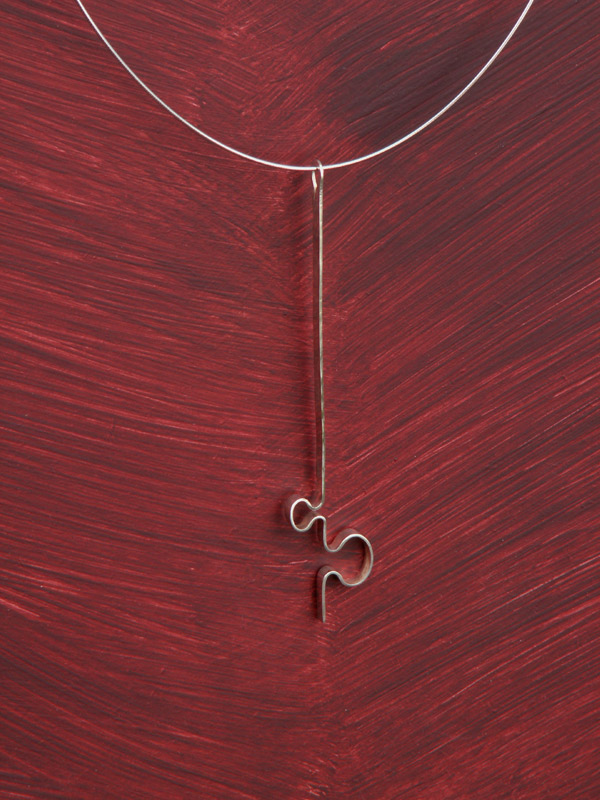 The key, silver pendant